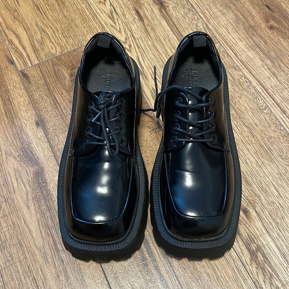 Truffle Collection chunky lace up shoes with exaggerated sole in black